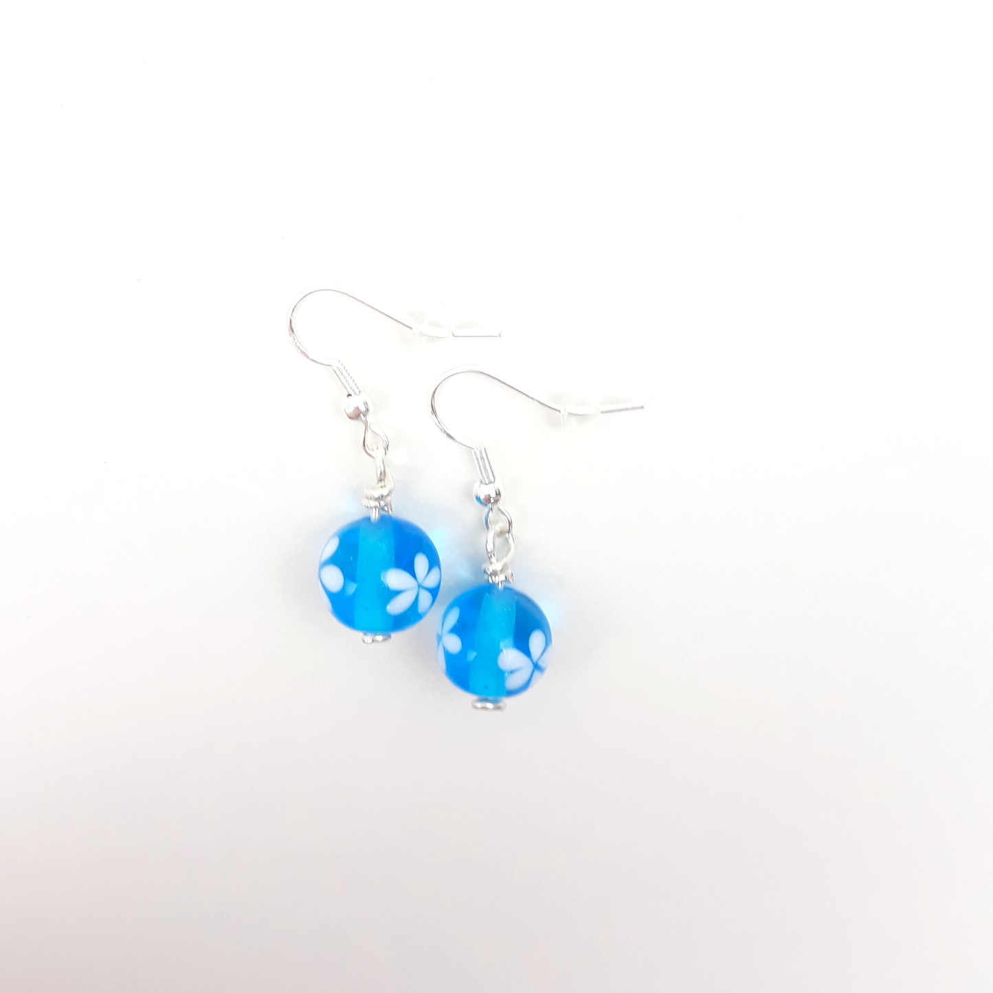 Blümchen-Ohrringe helltürkis