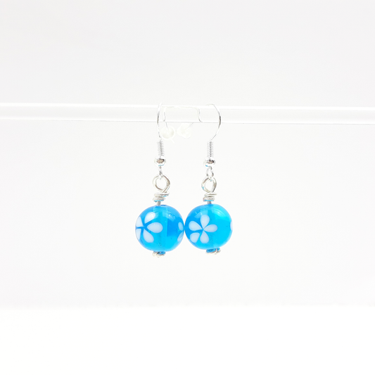 Blümchen-Ohrringe helltürkis