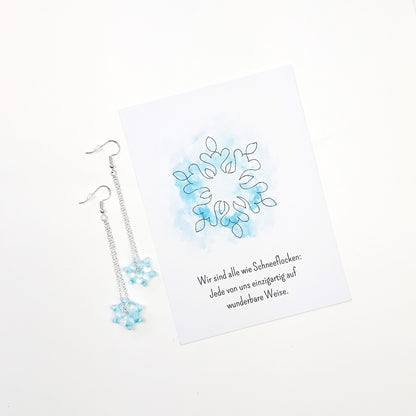 Handgedrehte Glasperle in Schneeflocken-Design