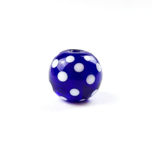 Handgefertigte Glasperle dunkelblau Punkte