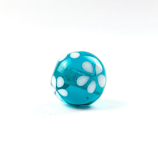 handgefertigte Glasperle dunkeltürkis Blüten