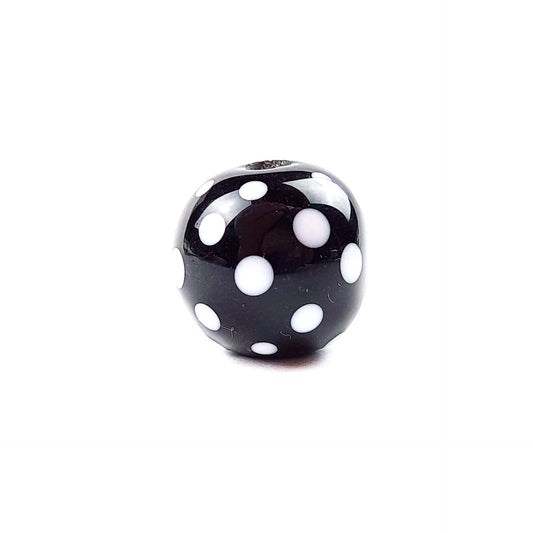 handgefertigte Glasperle schwarz Punkte